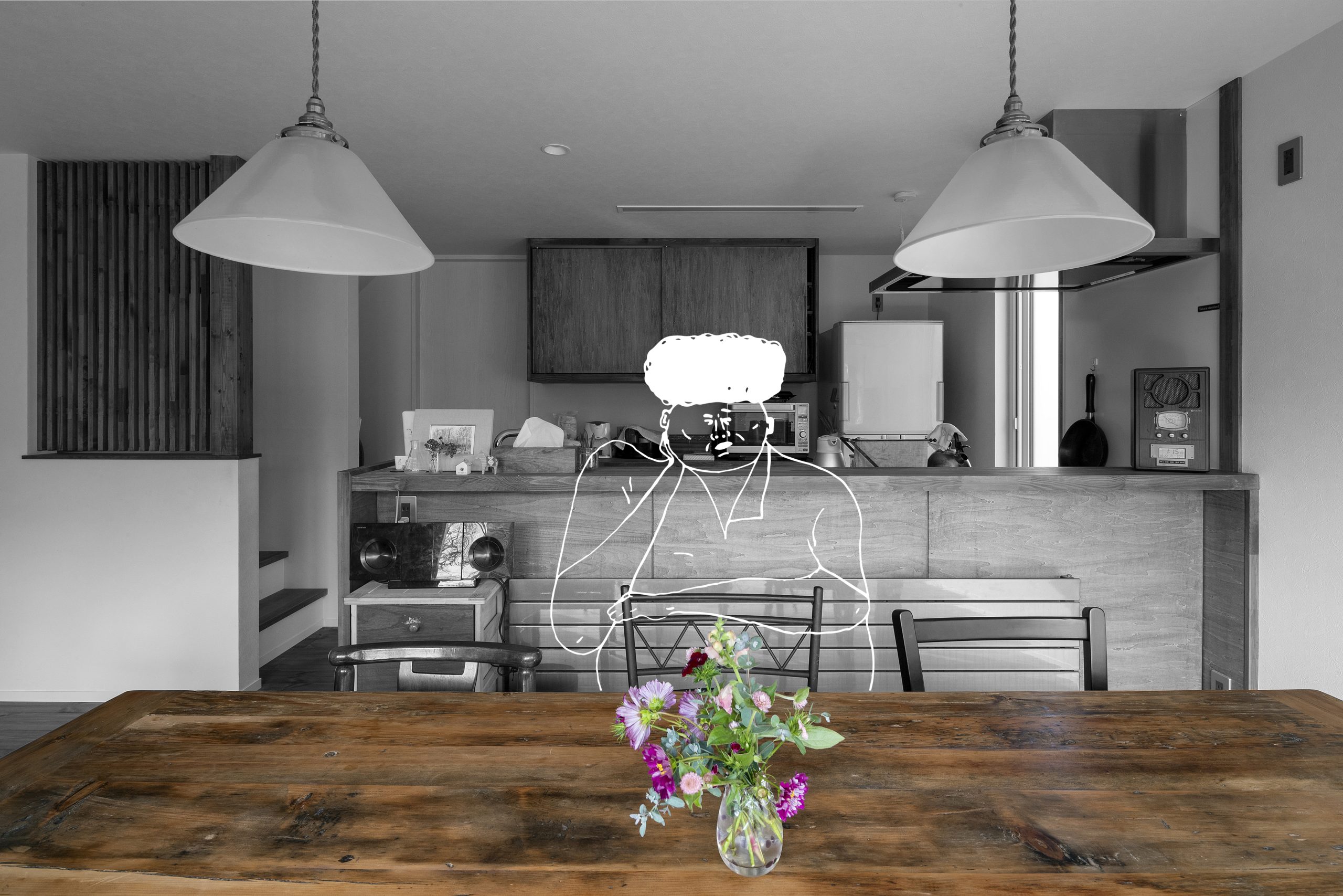 店舗付き住宅のアートホーム施工事例。木の温もりあふれるリビング・ダイニングの様子。